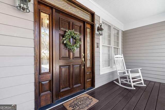 property entrance with a porch