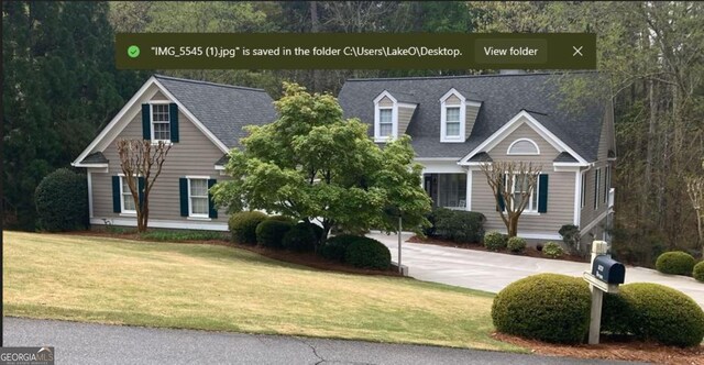 1020 Troublesome Creek Ln, Greensboro, GA 30642 - cape cod-style house featuring a front lawn