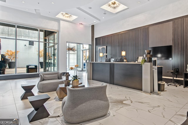 400 W Peachtree St NW Unit 3204, Atlanta, GA 30308 - reception with a high ceiling and recessed lighting