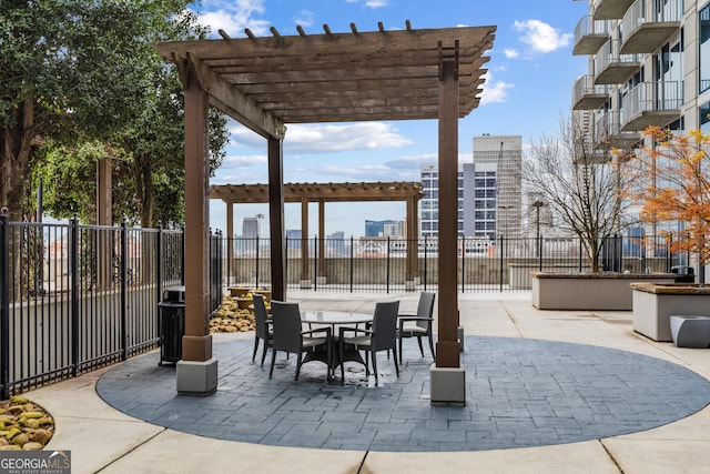 400 W Peachtree St NW Unit 3204, Atlanta, GA 30308 - view of patio / terrace with a pergola and outdoor dining space