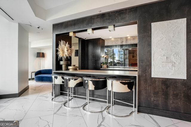 400 W Peachtree St NW Unit 3204, Atlanta, GA 30308 - bar area featuring marble finish floors and baseboards