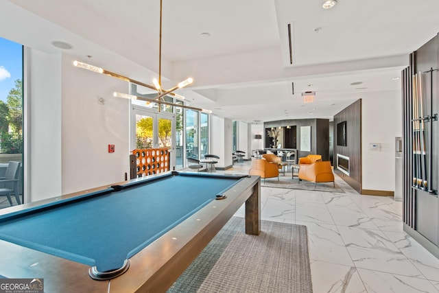 400 W Peachtree St NW Unit 3204, Atlanta, GA 30308 - playroom featuring light marble finish floors, pool table, french doors, and a chandelier
