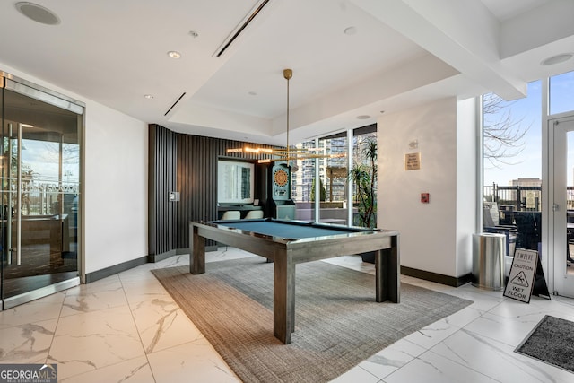 400 W Peachtree St NW Unit 3204, Atlanta, GA 30308 - playroom featuring light marble finish flooring, billiards, a raised ceiling, and recessed lighting