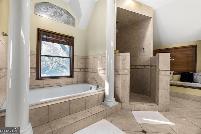 full bath featuring a walk in shower, tile patterned flooring, a garden tub, and decorative columns