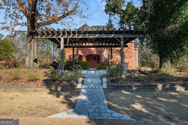 exterior space featuring a pergola