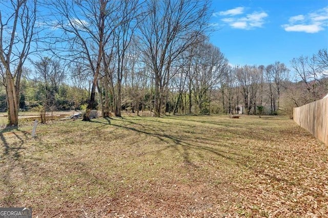 view of yard featuring fence