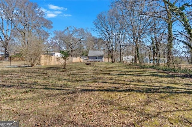 view of yard featuring fence