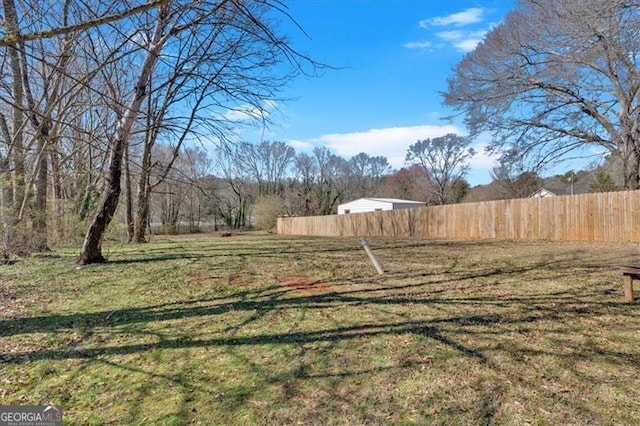 view of yard featuring fence