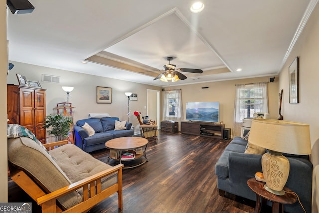 4740 Arbor Meadows Dr, Cumming, GA 30040 - living room with wood finished floors, visible vents, a ceiling fan, ornamental molding, and a tray ceiling
