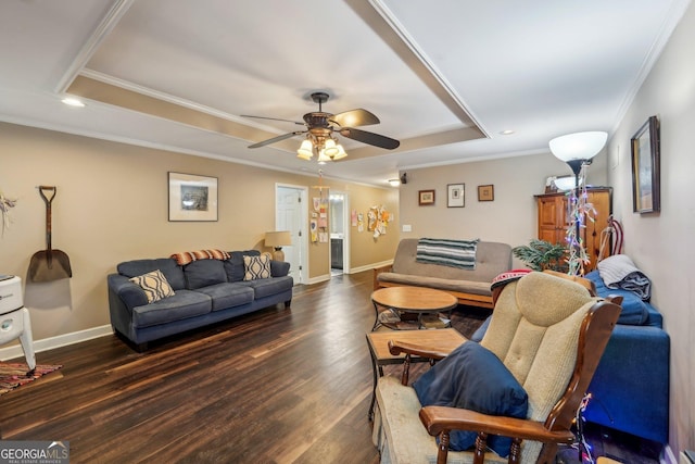 4740 Arbor Meadows Dr, Cumming, GA 30040 - living room with baseboards, a raised ceiling, a ceiling fan, ornamental molding, and dark wood-style flooring