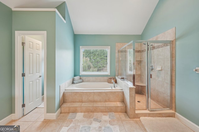 4740 Arbor Meadows Dr, Cumming, GA 30040 - full bathroom with a shower stall, vaulted ceiling, a bath, and tile patterned floors