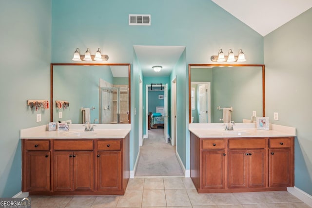 4740 Arbor Meadows Dr, Cumming, GA 30040 - ensuite bathroom with two vanities, lofted ceiling, visible vents, and a shower stall