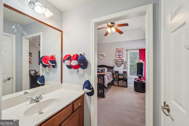 4740 Arbor Meadows Dr, Cumming, GA 30040 - bathroom featuring lofted ceiling, ceiling fan, vanity, and ensuite bath
