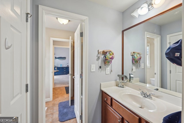 4740 Arbor Meadows Dr, Cumming, GA 30040 - bathroom with vanity, toilet, and tile patterned floors