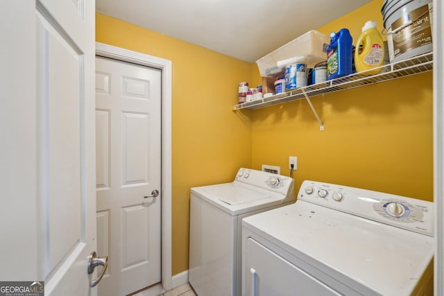 4740 Arbor Meadows Dr, Cumming, GA 30040 - laundry room with washing machine and dryer, laundry area, and baseboards