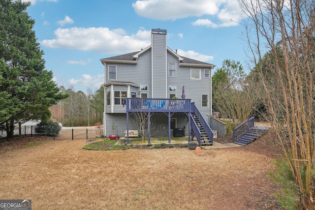 4740 Arbor Meadows Dr, Cumming, GA 30040 - rear view of property with a yard, a chimney, fence, a wooden deck, and stairs