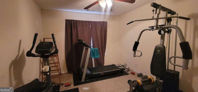 workout area featuring ceiling fan, carpet floors, a textured ceiling, and visible vents