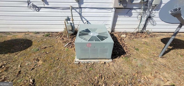 exterior details with central AC and gas meter