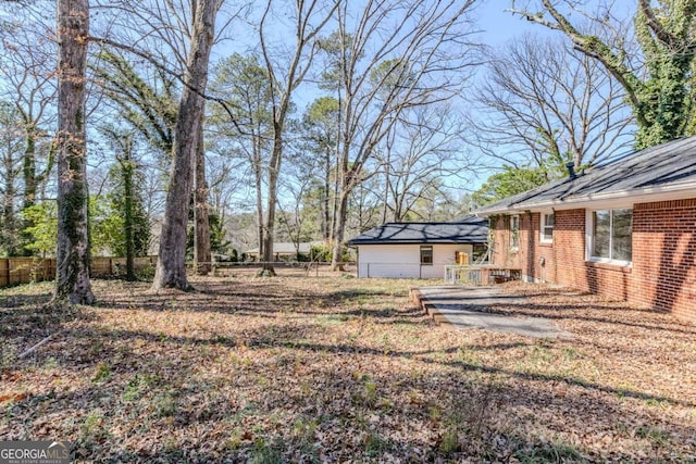 view of yard with fence