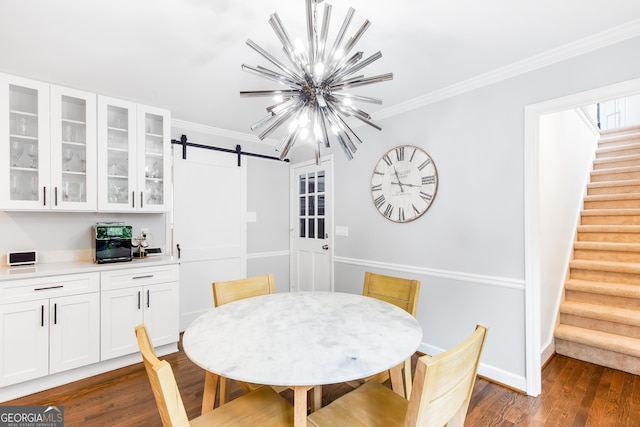 dining space with a notable chandelier, stairway, dark wood finished floors, and crown molding