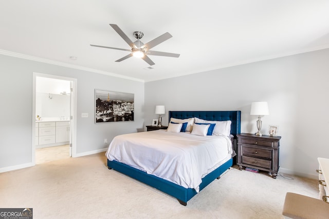 bedroom featuring ornamental molding, light carpet, ceiling fan, ensuite bath, and baseboards