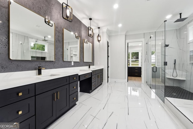 full bath featuring a healthy amount of sunlight, marble finish floor, a shower stall, and vanity