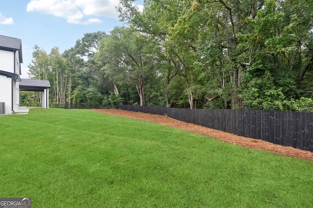 view of yard featuring fence