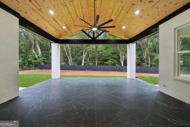 view of patio with fence, a gazebo, and ceiling fan