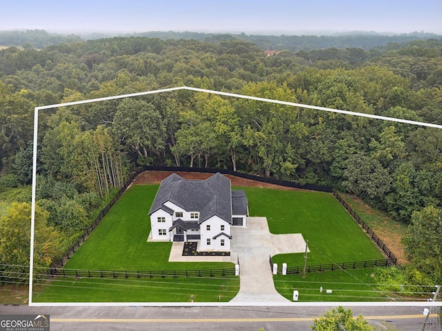 bird's eye view featuring a view of trees