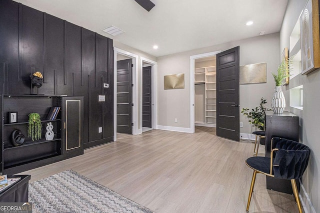 interior space featuring recessed lighting, visible vents, light wood-style flooring, and baseboards