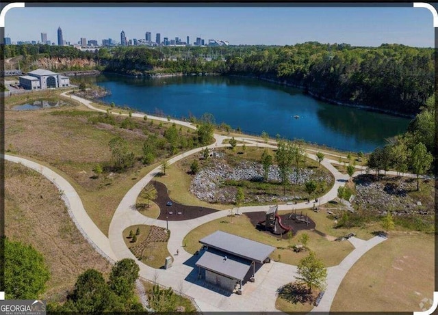 bird's eye view with a view of city and a water view