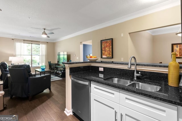 kitchen featuring dishwasher, open floor plan, dark stone countertops, dark wood-style flooring, and a sink