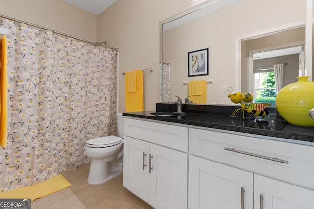 full bath featuring vanity, tile patterned flooring, toilet, and a shower with curtain