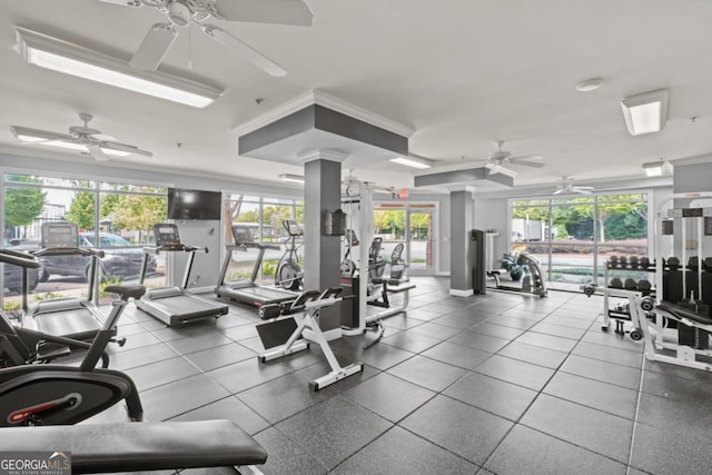 gym with crown molding and ceiling fan