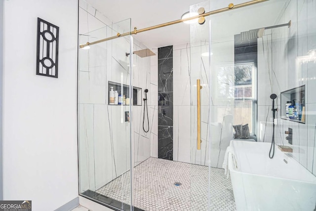 full bathroom with a stall shower and a freestanding tub