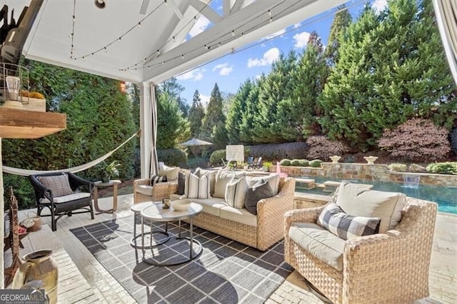 view of patio / terrace featuring an outdoor pool and an outdoor living space