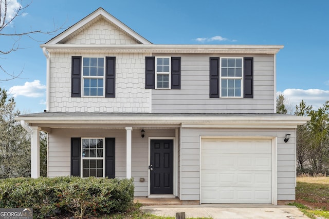 traditional home featuring an attached garage