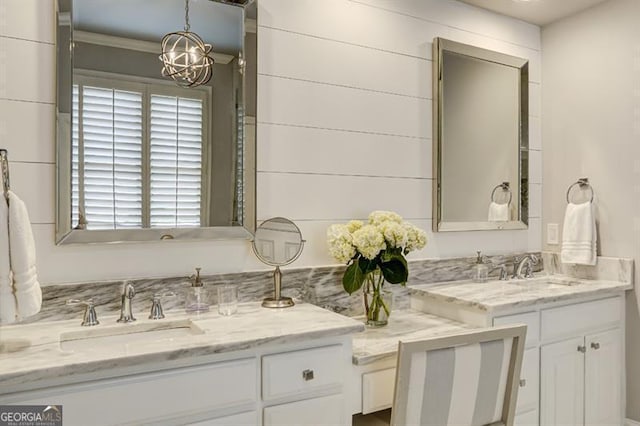 full bathroom with plenty of natural light and vanity