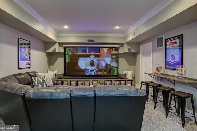 home theater featuring carpet floors, recessed lighting, visible vents, and crown molding