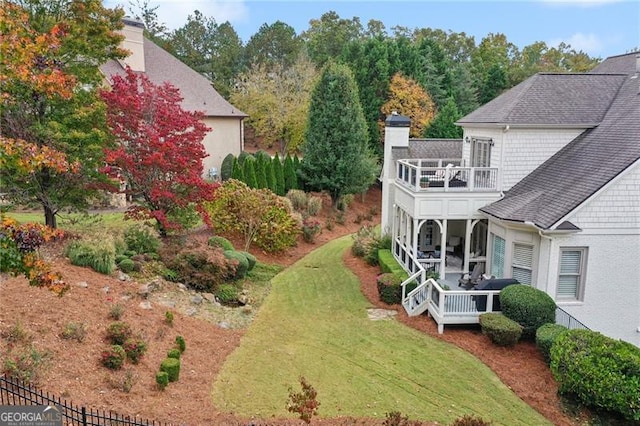 view of yard with a deck