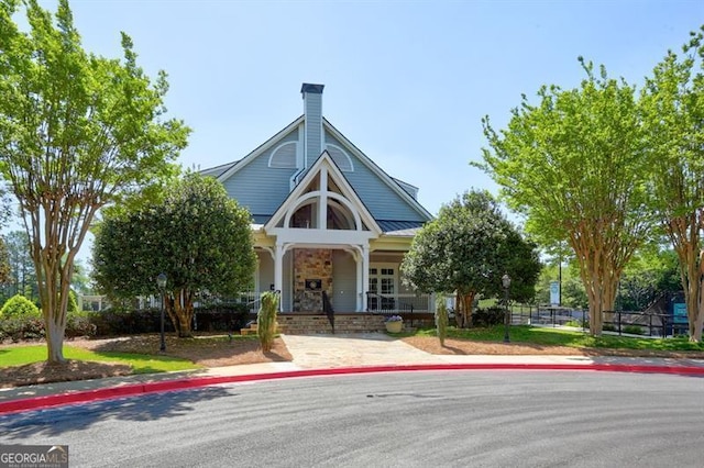 view of building exterior with fence