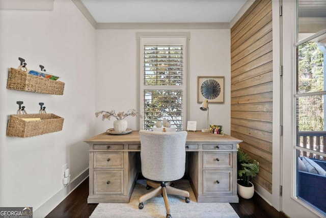 office space with dark wood-style floors and baseboards