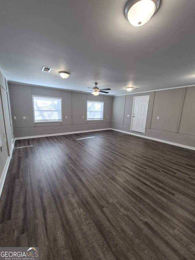 unfurnished bedroom featuring visible vents, ceiling fan, and carpet