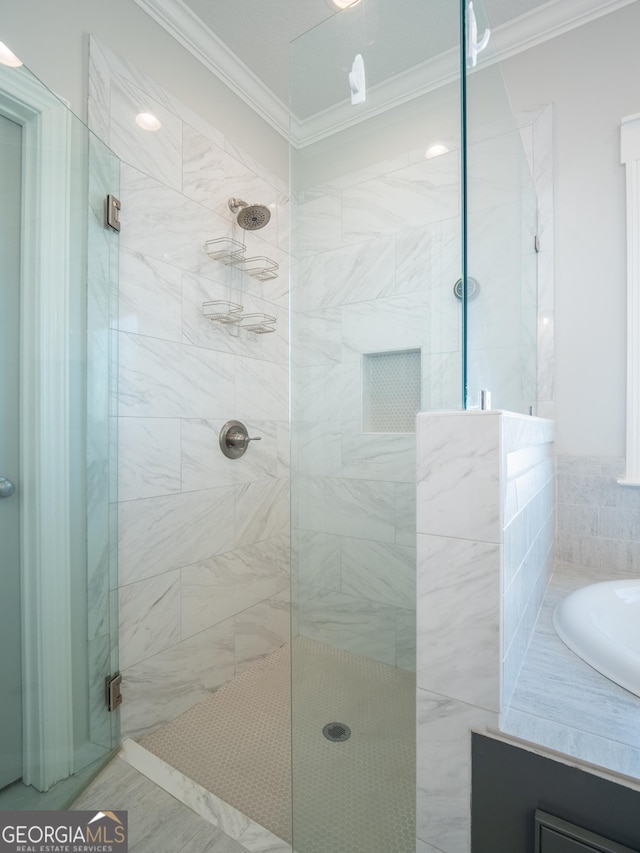 full bathroom with ornamental molding and a stall shower