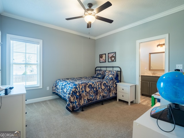 bedroom featuring light carpet, ornamental molding, connected bathroom, and baseboards