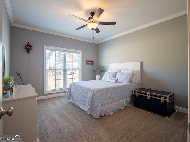 bedroom with ornamental molding, carpet, baseboards, and a ceiling fan