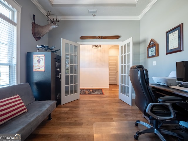 office space with ornamental molding, french doors, and wood finished floors