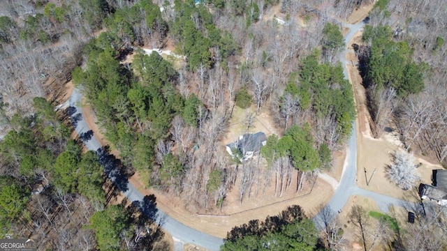 bird's eye view featuring a view of trees