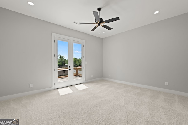 unfurnished room featuring recessed lighting, baseboards, french doors, and light colored carpet