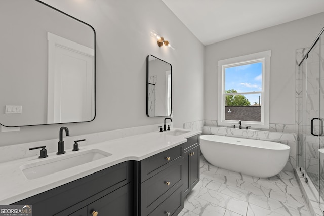 full bath featuring marble finish floor, double vanity, a stall shower, and a sink